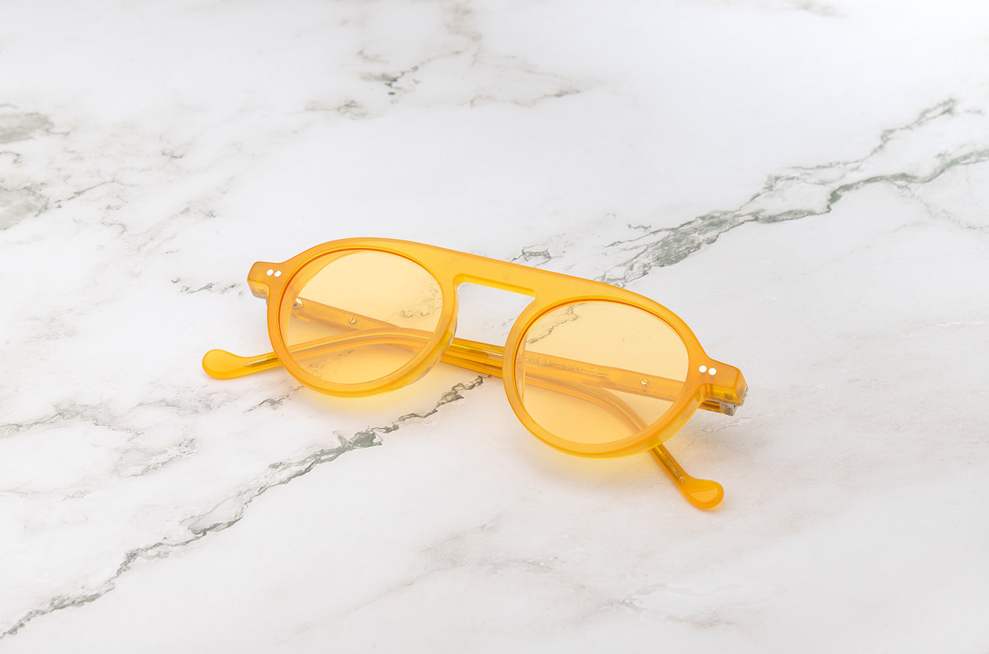 Peter Frank men's round sunglasses with a yellow frame.