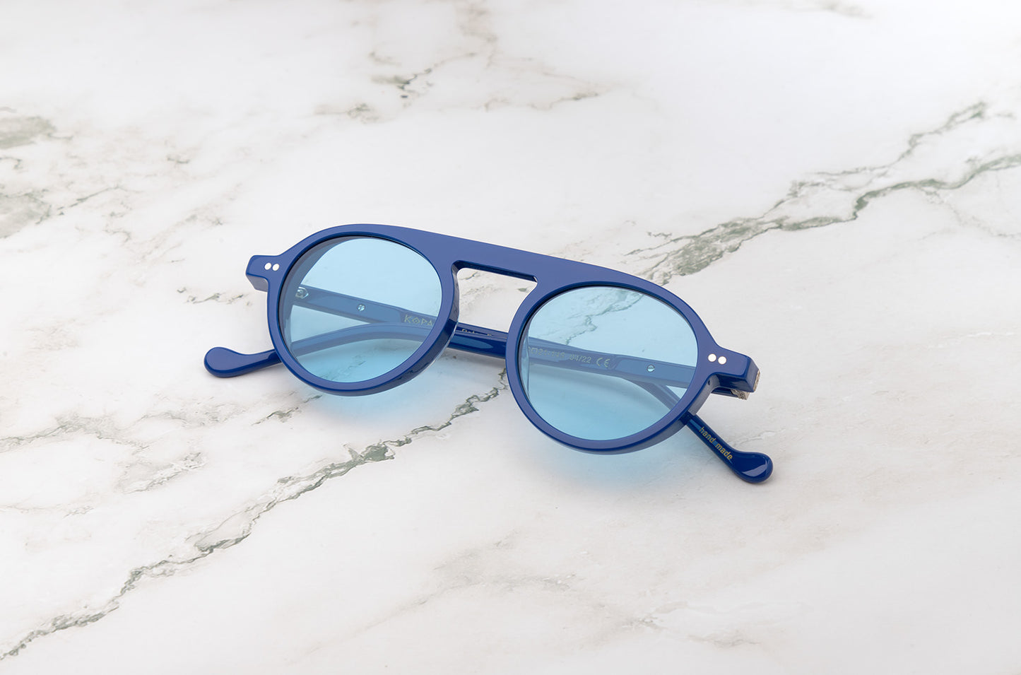 Blue round style sunglasses for men from Kopajos