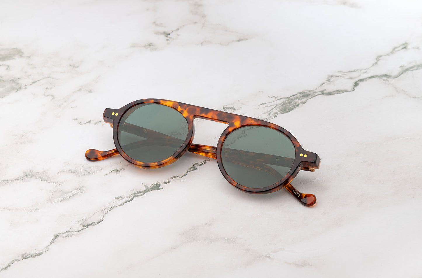 Peter Frank round sunglasses tortoiseshell with dark lenses