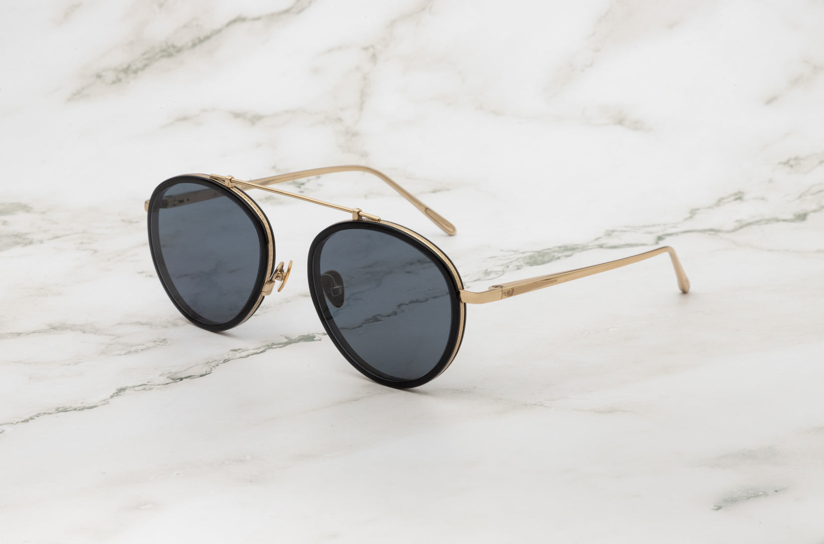 A pair of modern Kopajos Sasha Davidov square aviator sunglasses.