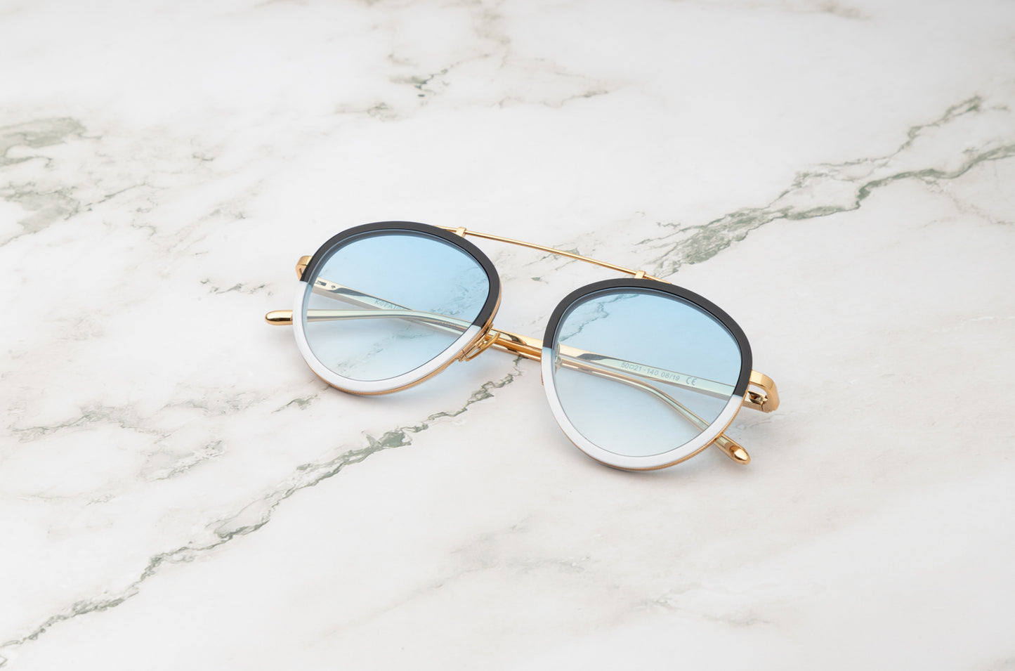 A retro vibe with the Kopajos Sasha Davidov vintage aviator sunglasses.