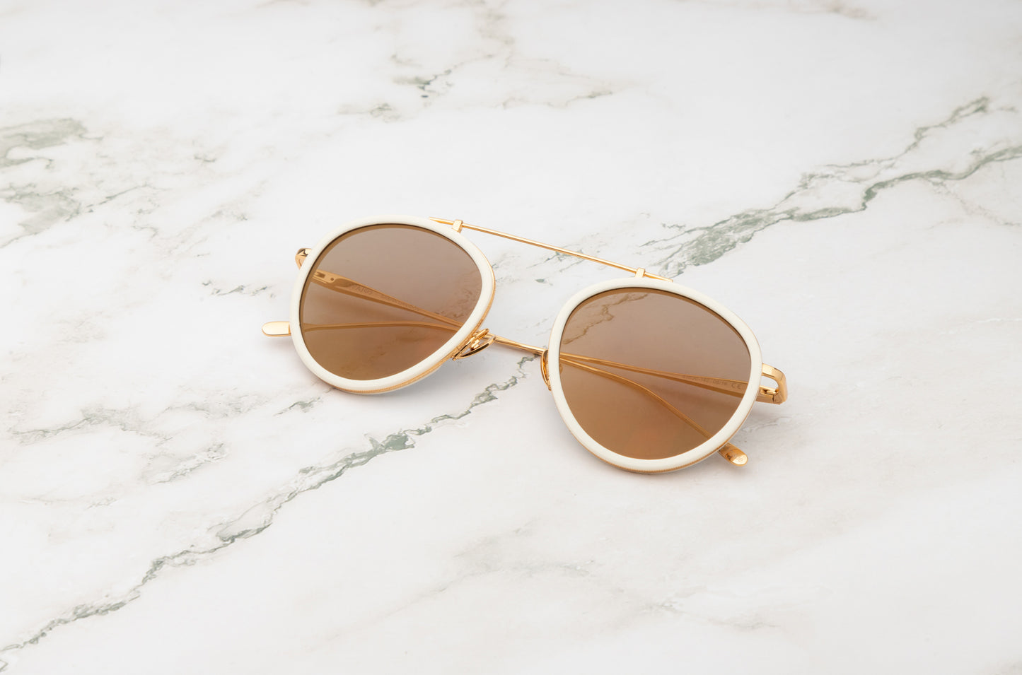 The Kopajos Sasha Davidov, white polarized aviator sunglasses for any occasion.