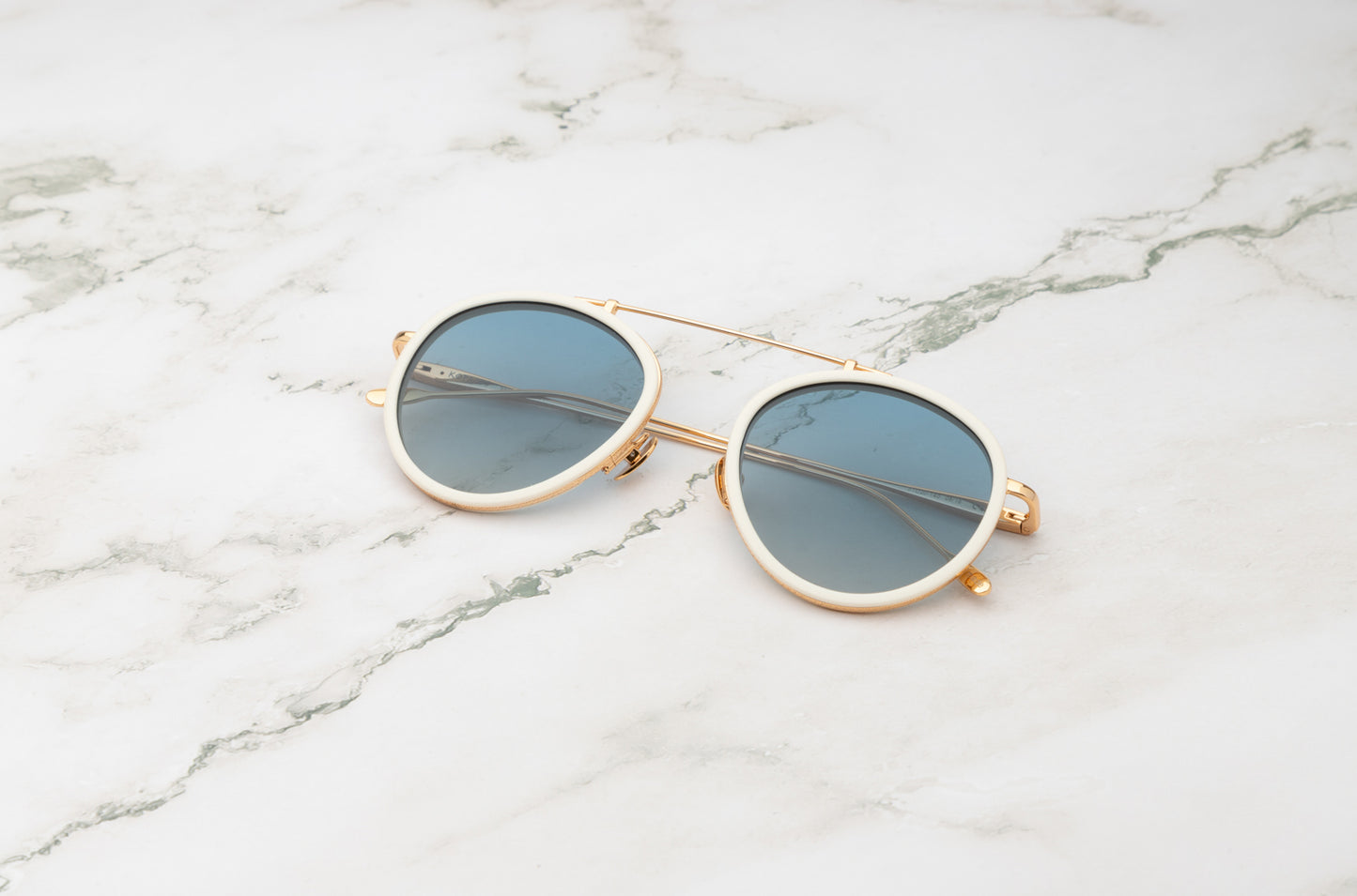 oversized white aviator sunglasses by Kopajos.