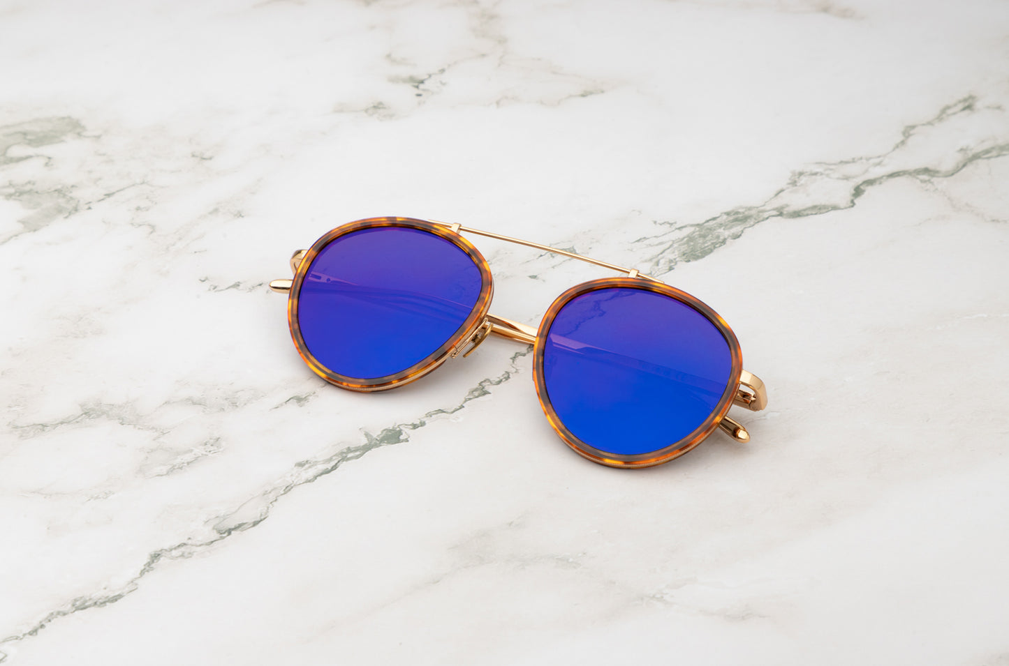 Side view of the Sasha Davidov gold aviator sunglasses