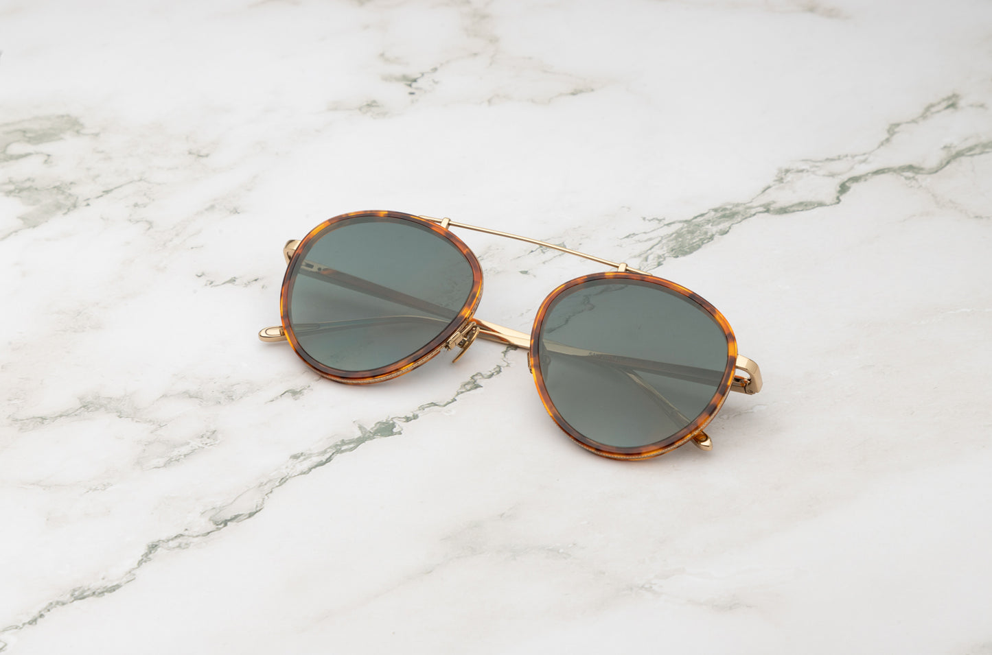 A lifestyle photo of the Kopajos Sasha Davidov men's aviator sunglasses