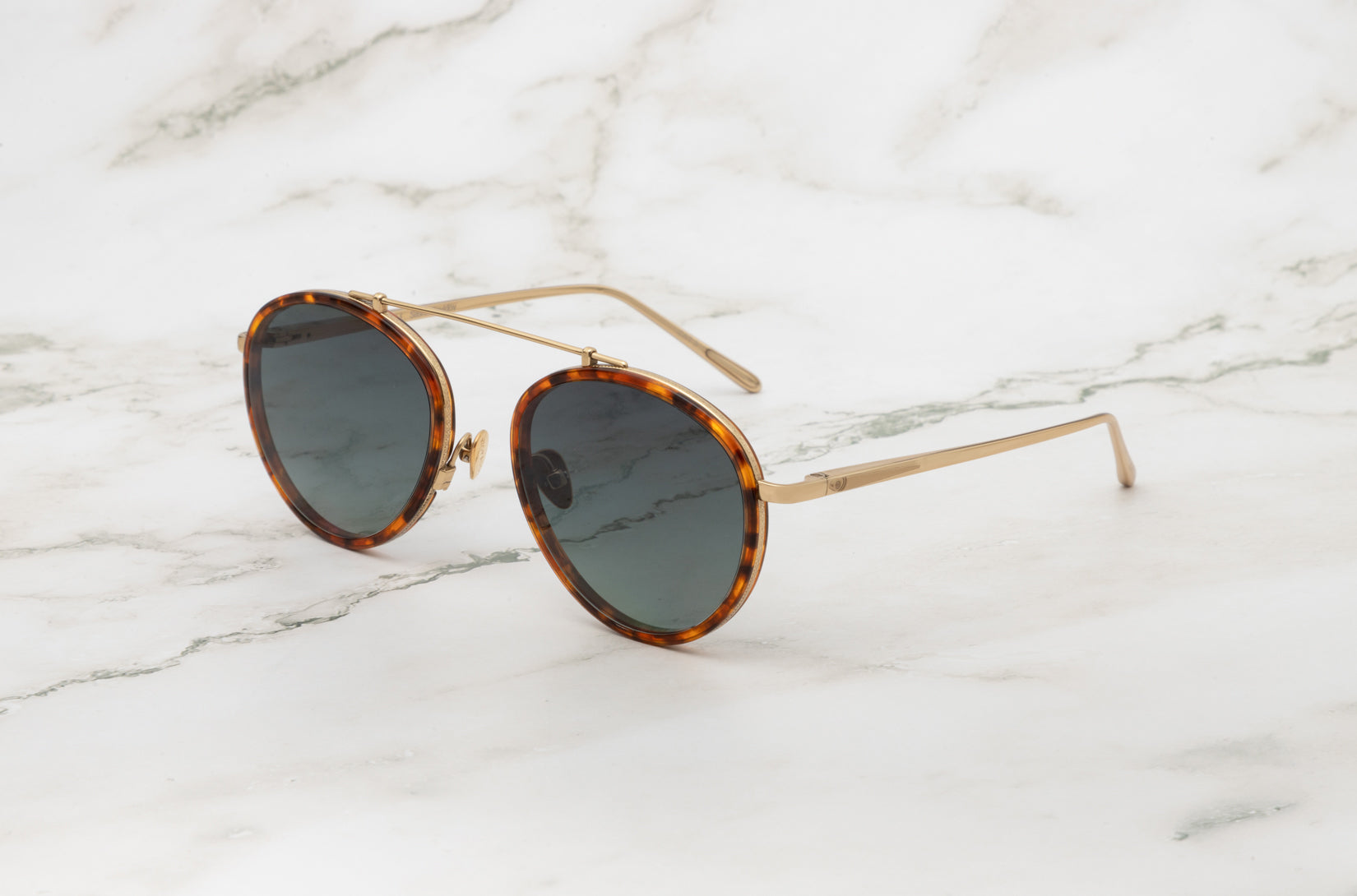 The delicate and chic Kopajos Sasha Davidov tortoise aviator sunglasses.