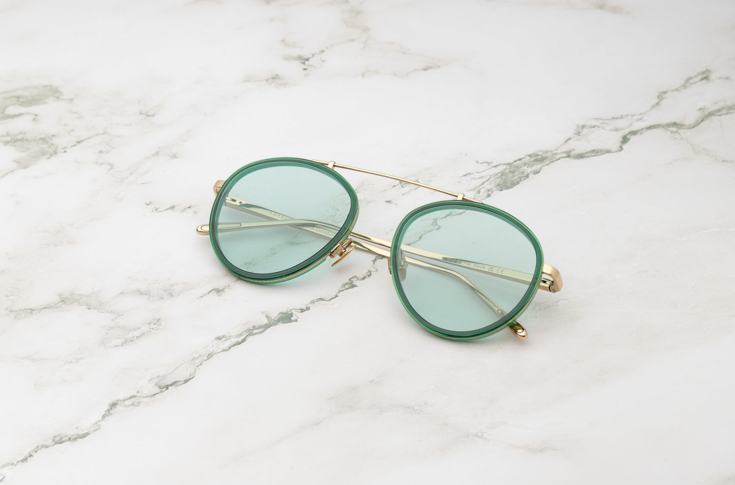 the Sasha Davidov green aviator sunglasses.