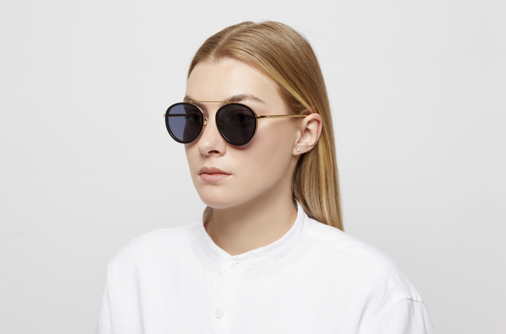 The iconic women's aviator sunglasses, model Sasha Davidov.