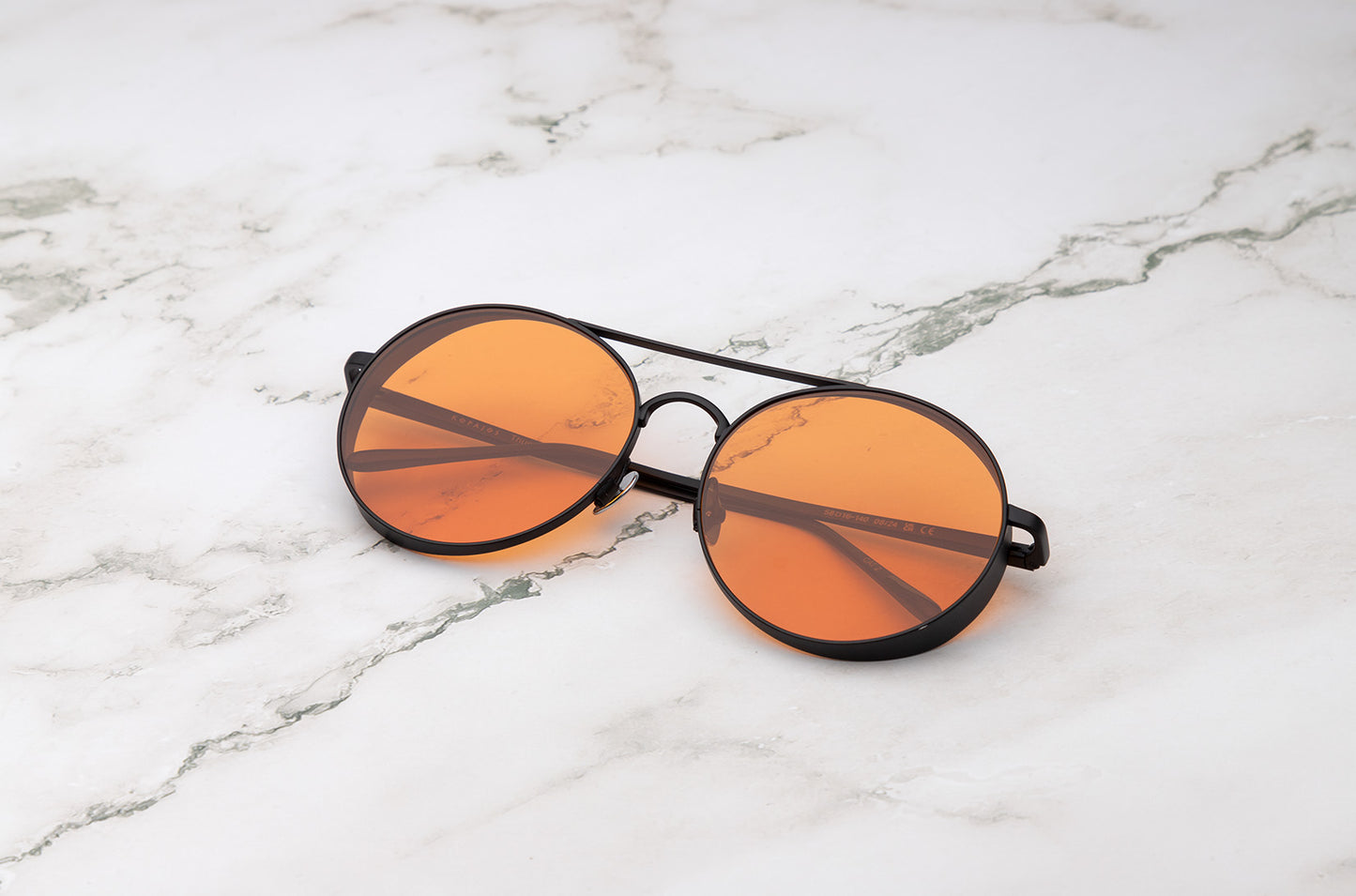 The understated and sophisticated Kopajos Thunderball small round sunglasses.