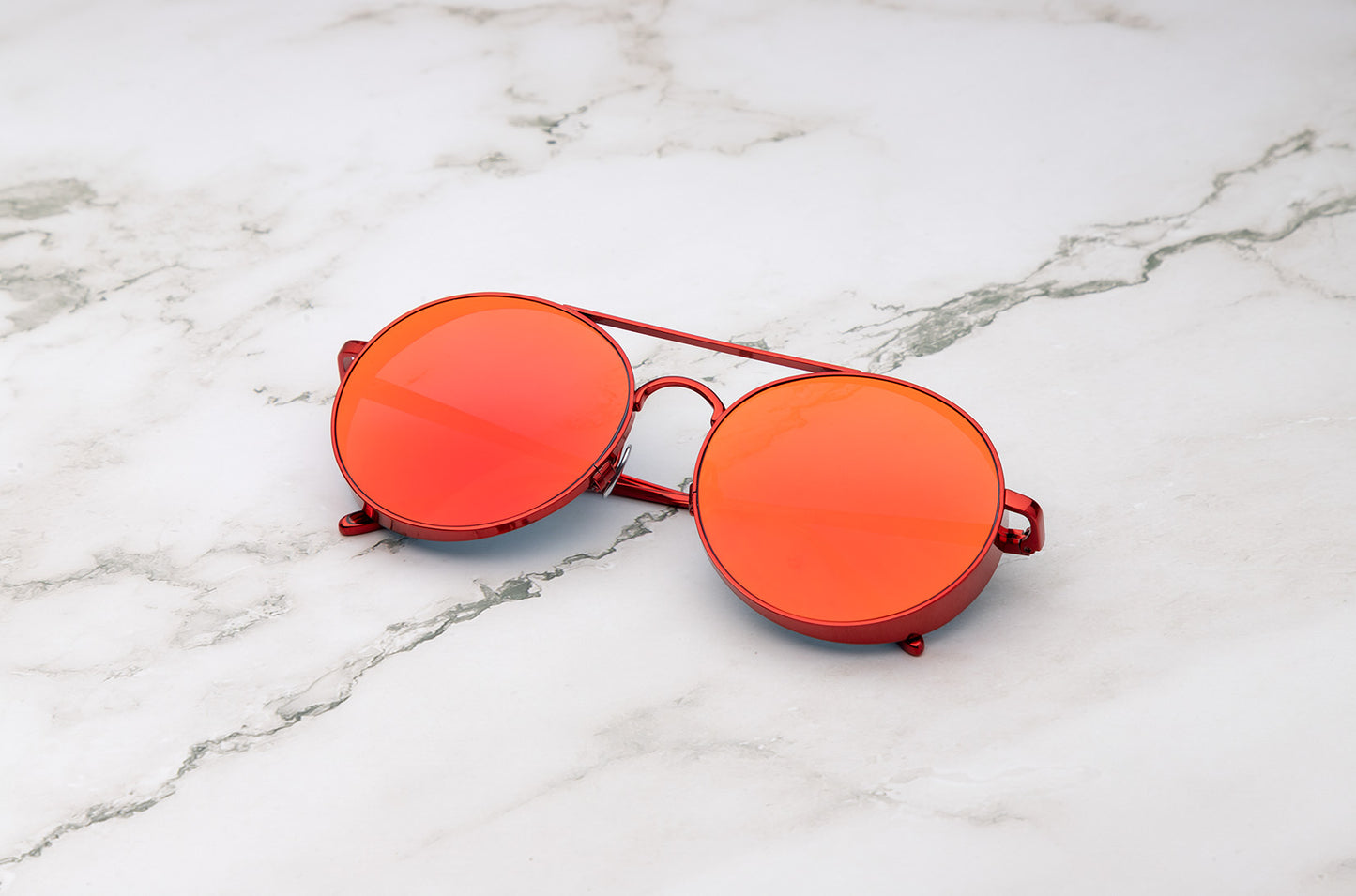 Thunderball retro round sunglasses with red lenses