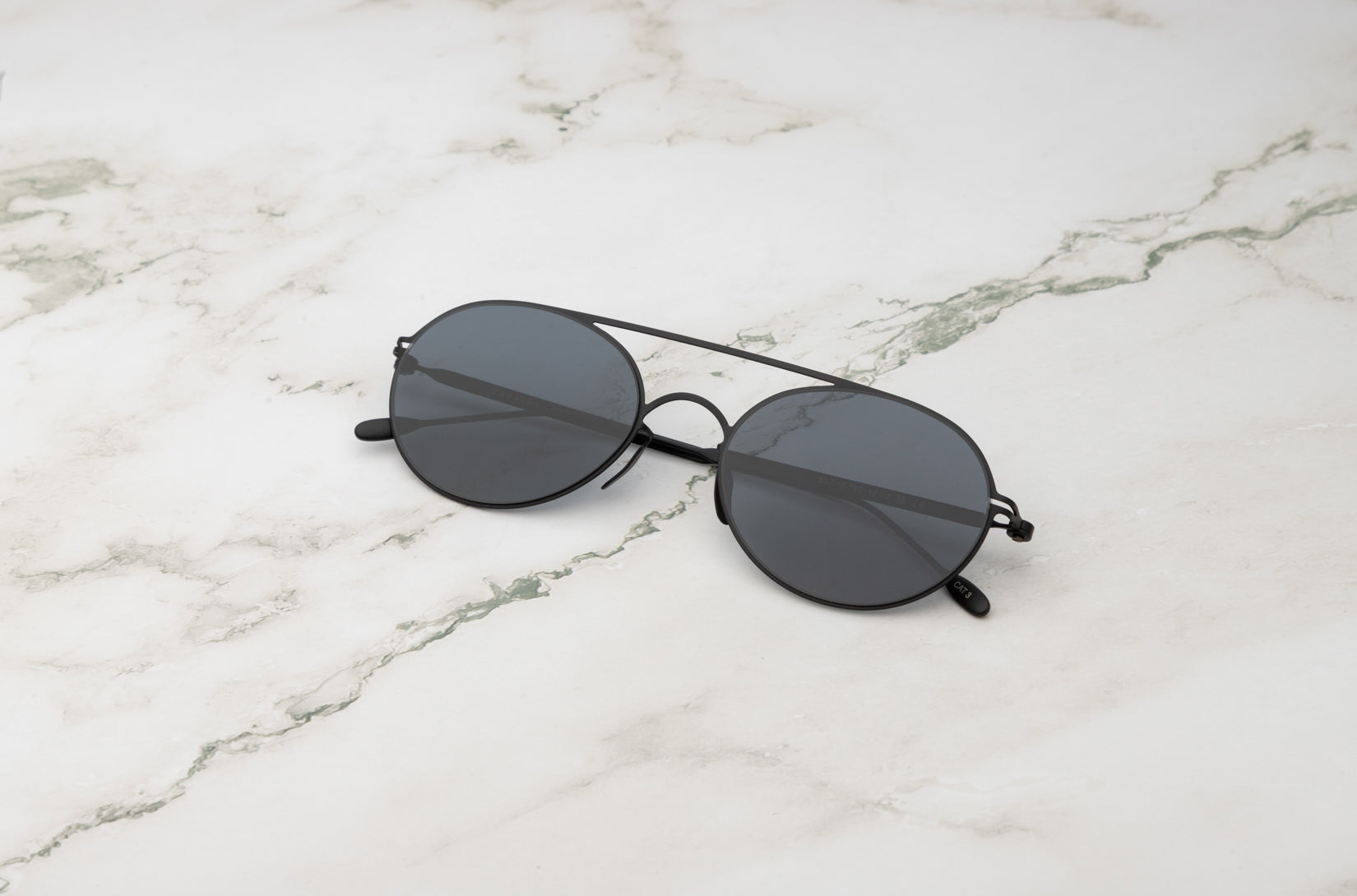 Kopajos Tracy round sunglasses with polarized lenses