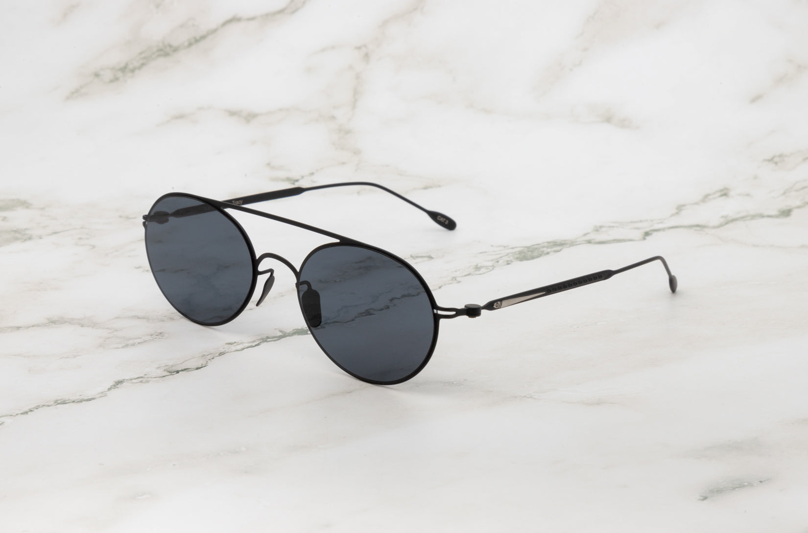 Front view of the chic and sophisticated Tracy womens round sunglasses.