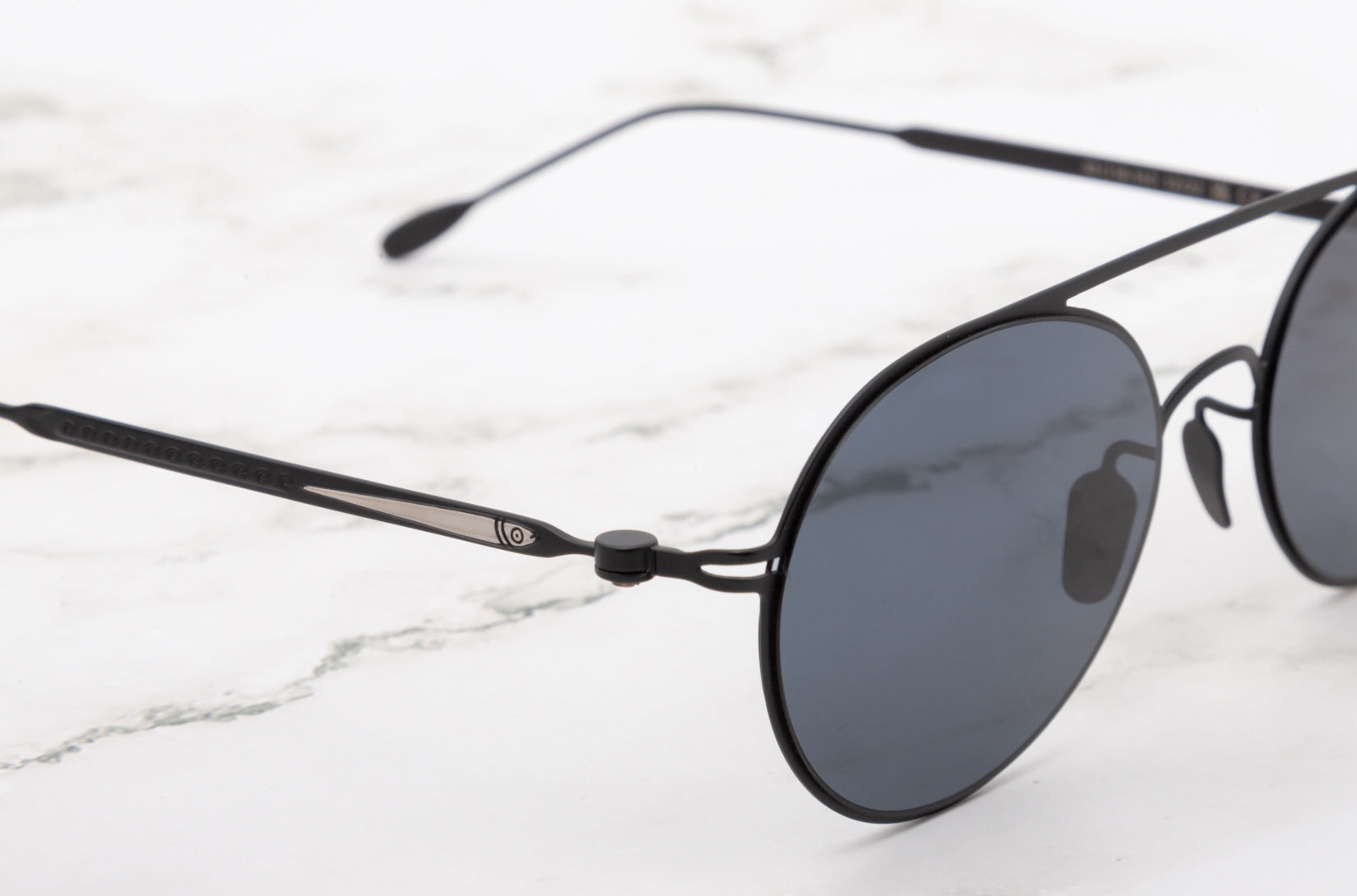 The Kopajos Tracy, the quintessential round sunglasses for women.