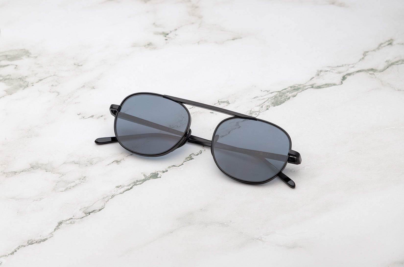 A bold, intellectual look with the Kopajos Willard White large round sunglasses.
