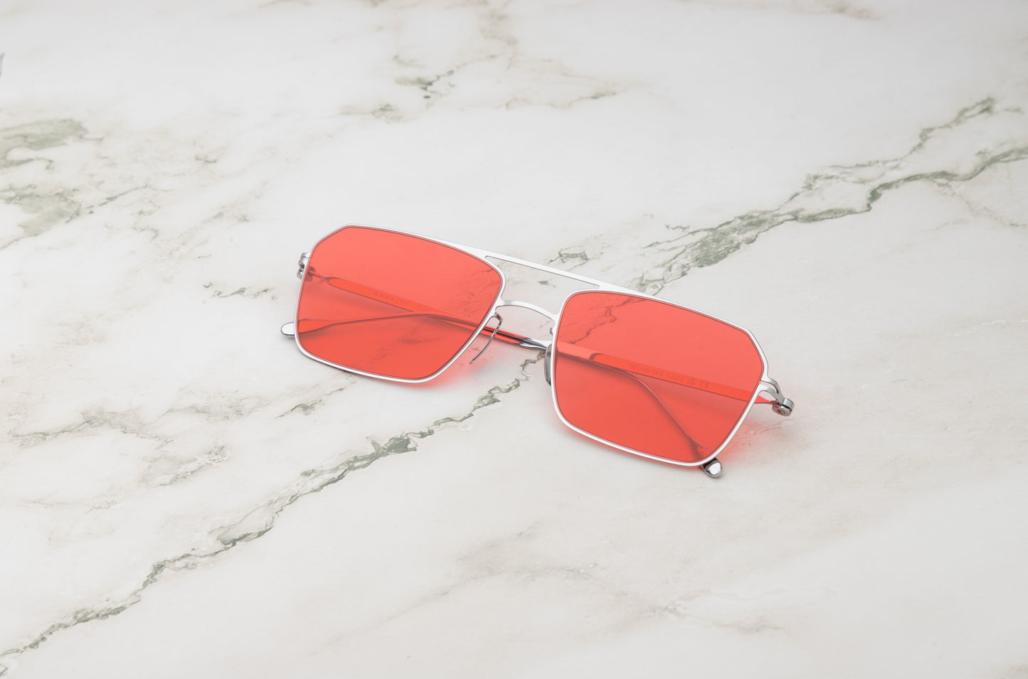 The Zora, a pair of rectangular frame sunglasses for men offering a bold, confident style.