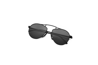 Kopajos black aviator sunglasses for men and women with polarized lenses.