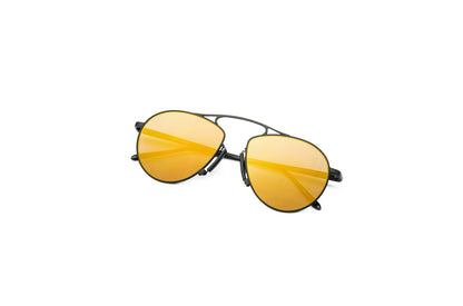 Kopajos black aviator sunglasses for men and women with yellow polarized lenses.