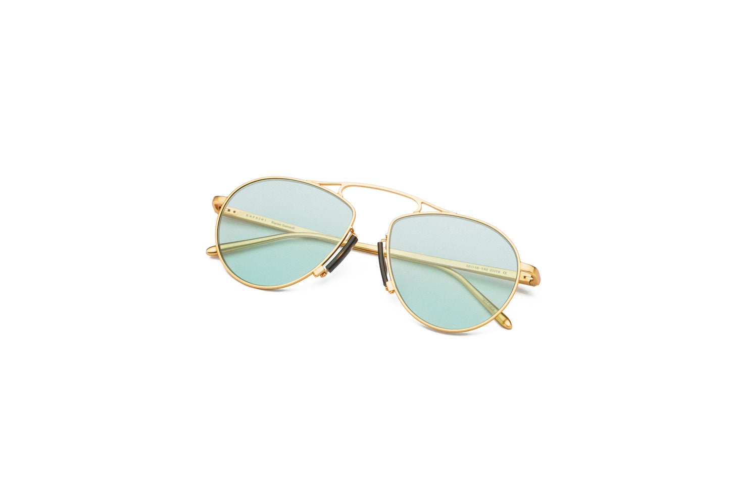 Kopajos gold aviator sunglasses for men and women with light green polarized lenses.