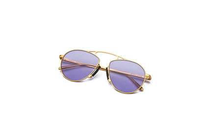 Kopajos gold aviator sunglasses for men and women with purple polarized lenses.