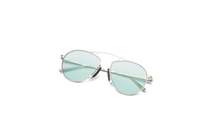 Baron Samedi silver aviator sunglasses for men and women with light green polarized lenses.