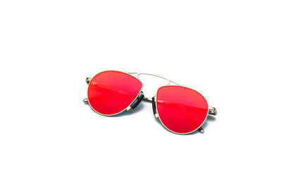 Baron Samedi silver aviator sunglasses for men and women with red polarized lenses.