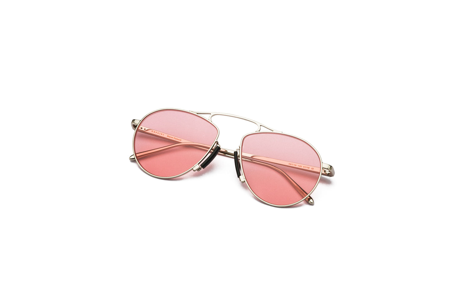 Baron Samedi silver aviator sunglasses for men and women with pink polarized lenses.