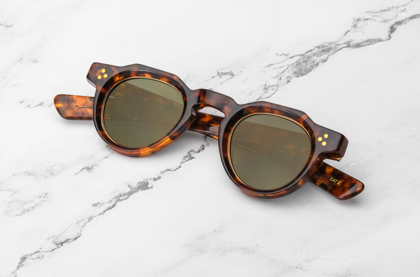 Brown round sunglasses with polarized lenses by Kopajos