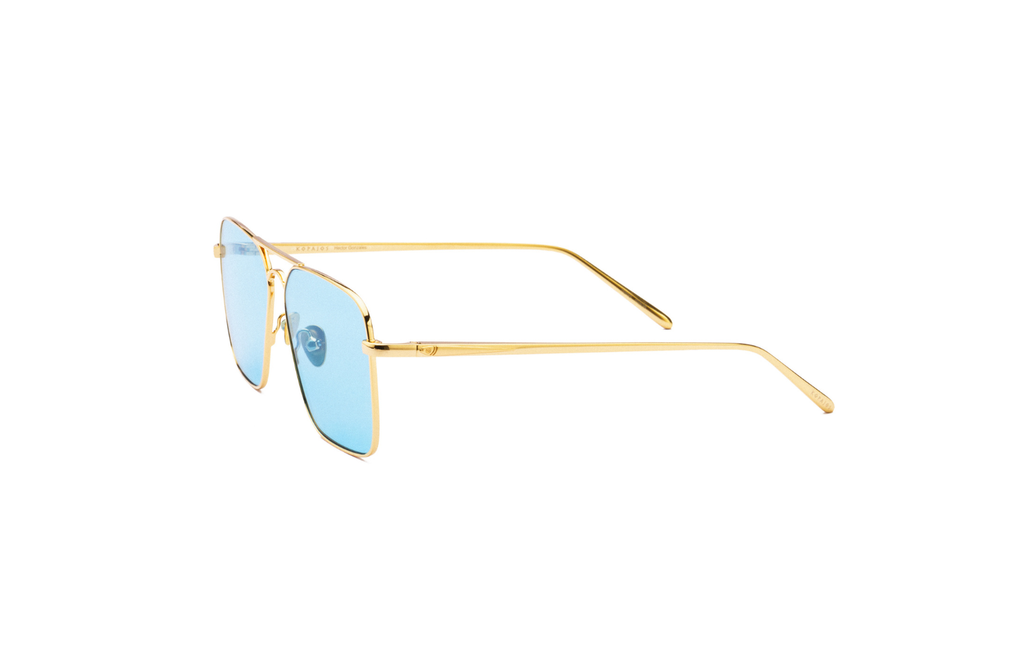 Side view of Hector Gonzales aviator sunglasses by Kopajos with gold frame and light blue polarized lenses.