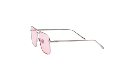 Hector Gonzales aviator sunglasses by Kopajos with silver frame and pink polarized lenses, shown from the side.