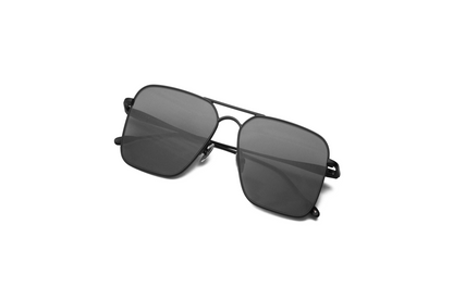 Top view of Hector Gonzales aviator sunglasses by Kopajos for men and women with black frame, dark polarized lenses, and folded temples.