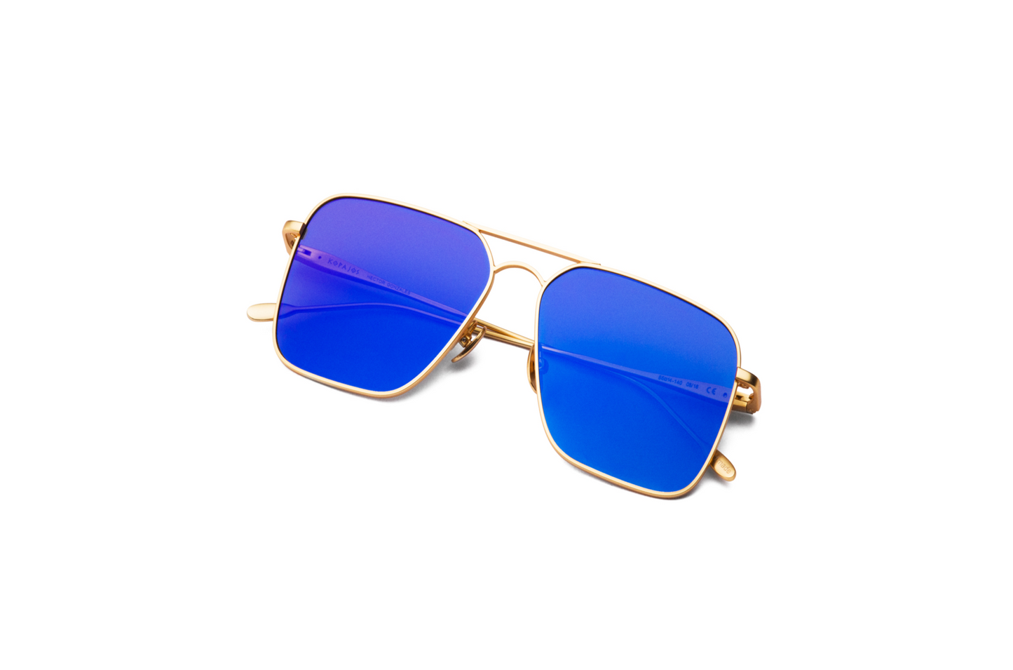 Top view of Hector Gonzales aviator sunglasses by Kopajos for men and women with gold frame, blue polarized lenses, and folded temples.