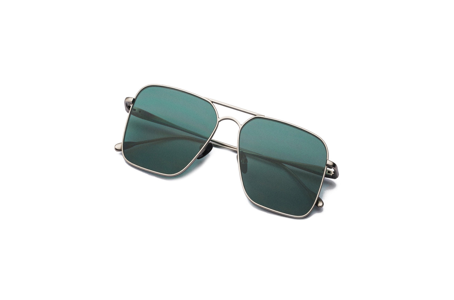 Top view of Hector Gonzales aviator sunglasses by Kopajos for men and women with silver frame, dark polarized lenses, and folded temples.