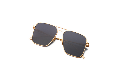 Top view of Hector Gonzales aviator sunglasses by Kopajos for men and women with gold frame, dark polarized lenses, and folded temples.