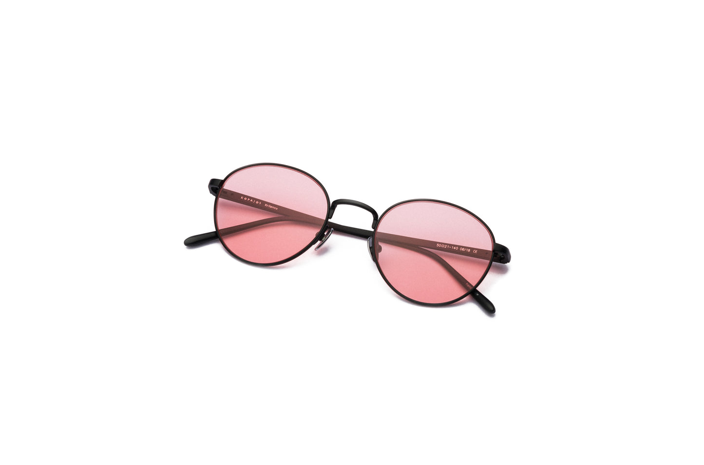 Black round sunglasses for women with polarized pink lenses by Kopajos