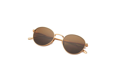 Gold round sunglasses for women and men with polarized brown lenses by Kopajos