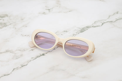 Lina round sunglasses by Kopajos with white frame and transparent purple polarized lenses for men and women.