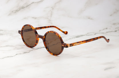 Kopajos Petra round tortoise sunglasses, a versatile accessory.
