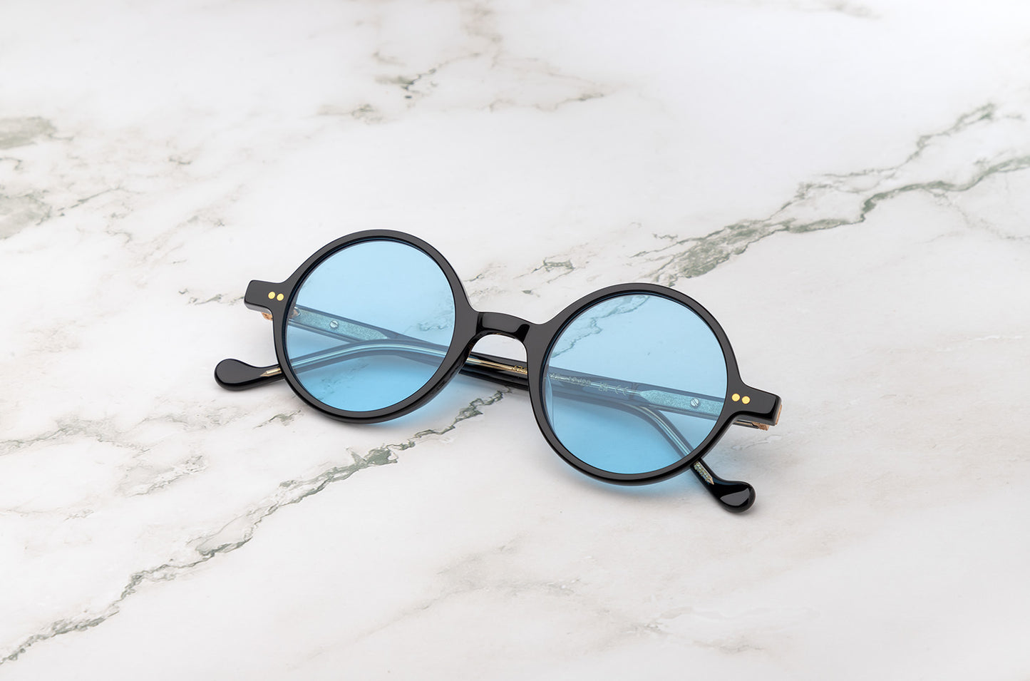 Kopajos Petra mens round sunglasses with polarized light blue lenses
