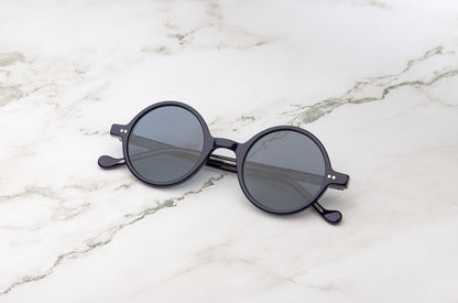 The Kopajos Petra, a pair of small round sunglasses for a sophisticated look.