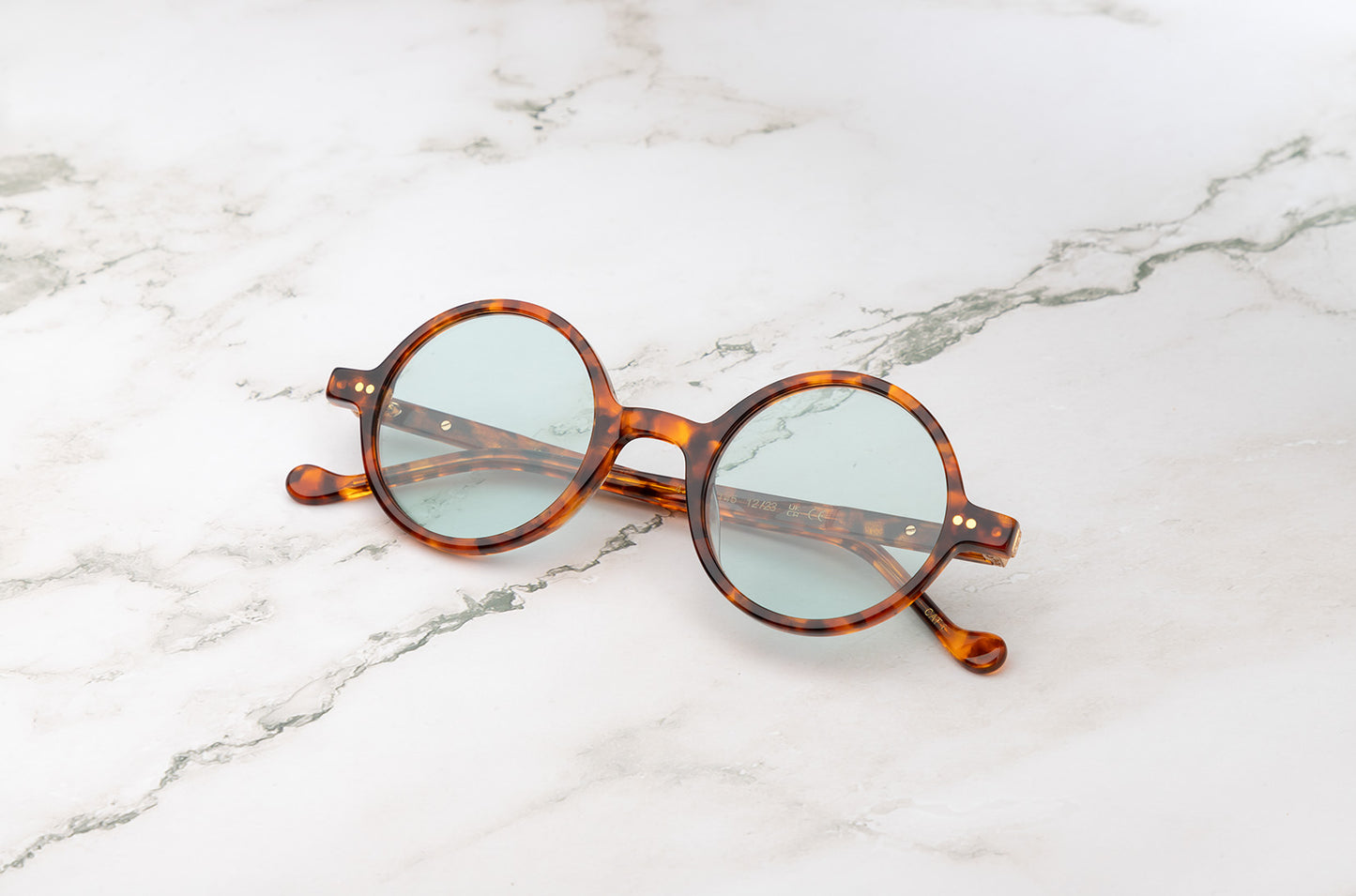 Kopajos Petra, a pair of chic, tortoise round sunglasses.